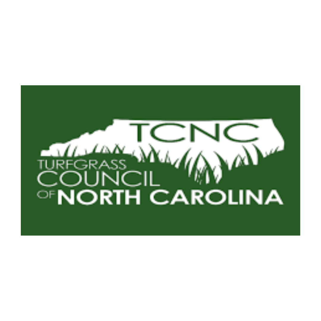 Green and white logo of the Turfgrass Council of North Carolina featuring the state outline with grass imagery and initials "TCNC."